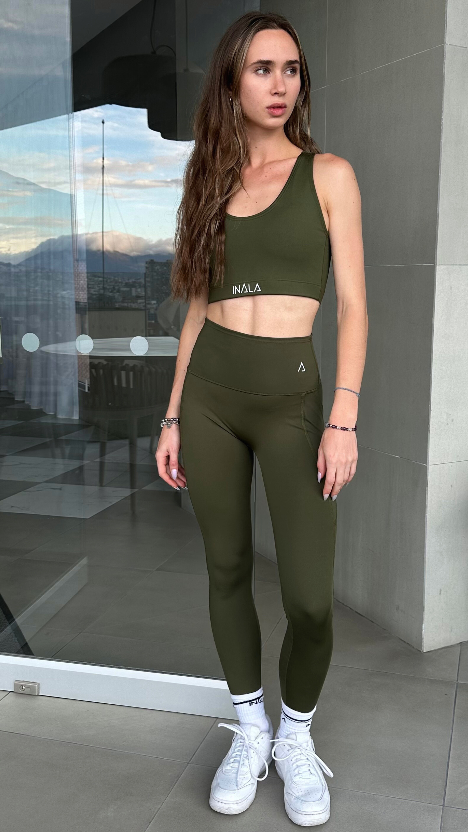 Flow Leggings con bolsillos laterales- Dark Green